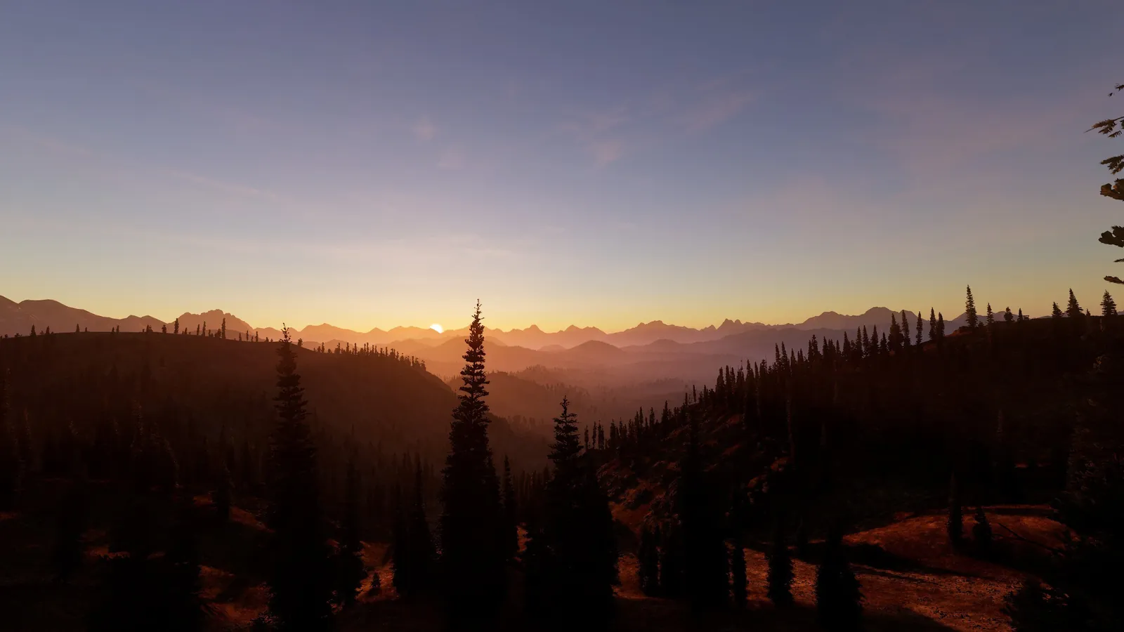 Layered ridgelines over a pine valley at sunset in New Laurentia